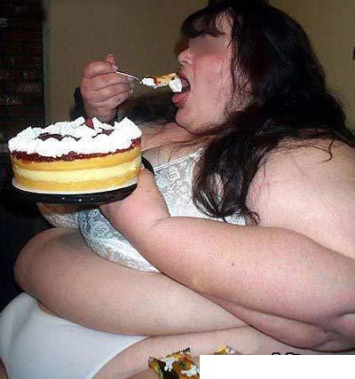 obese_woman_eating_cup_cake.jpg